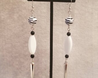 White and black spike earrings