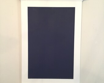 Creamy white chalkboard with chalk tray