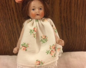 Antique German all bisque 5" doll house doll