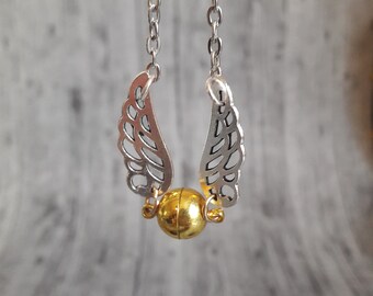 The Golden snitch Necklace: Golden Snitch Jewelry/ Necklace/ Harry Potter Jewelry/ Harry Potter Inspired Golden Snitch Necklace/ Quidditch