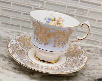 Vintage Paragon floral blue and gold gilt tea cup and saucer tea set, wedding gift, floral transfer, English bone china