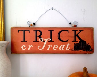 Halloween sign ,Trick or Treat plaque, trick or treat halloween sign,wood halloween sign,shabby chic halloween,beaded halloween sign.