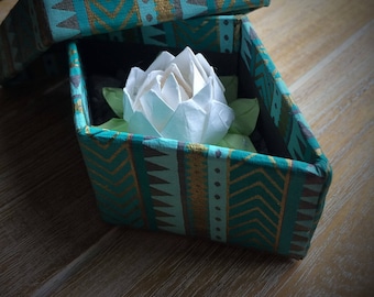 Origami lotus in a gift box