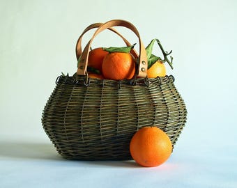 Oval green wicker basket purse