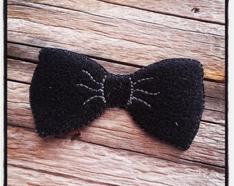 bow tie. Decal stickers, fusible fabric.
