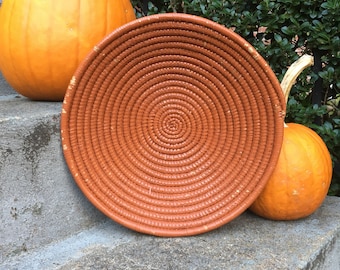 Burnt orange coiled basket boho wall basket unique orange coiled bowl basket