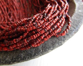MINI red glass seed beads, rustic opaque delicate spacer tube barre, irregular shape Indonesian - 1 to 2mm (44 inches std) 7ab1-4