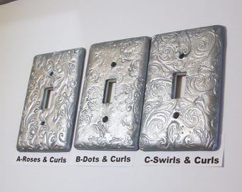 Metallic silver Swirls and curls light switch covers