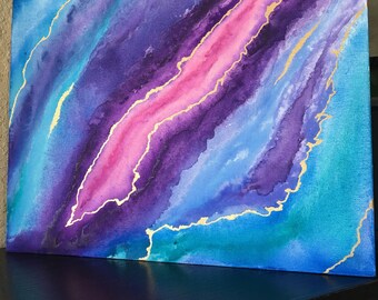 Geode-like watercolor painting with gold detail