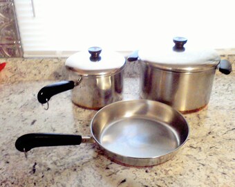 Revere Ware cookware Set 9 inch fry pan 3 qt. sauce pan 6 qt. stock pot Revere ware 1801 made in the USA
