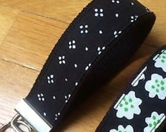 Black key fob made from Marimekko Muija fabric, Finland