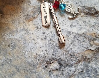 Handcrafted Novelty Star wars light saber charm keychain.