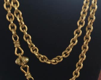 Gold Florentine ribbed chain with pearl and rhinestone attachment circa 1990