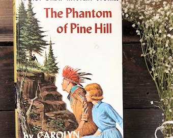 Vintage Nancy Drew hardcover of mystery story, The Phantom of Pine Hill by Carolyn Keene, classic children's, young adult book