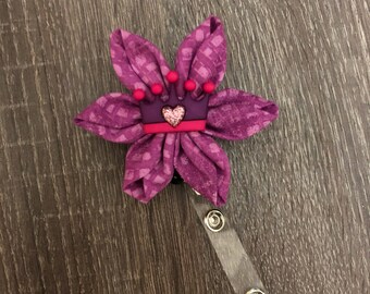 Flower badge reel