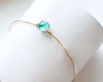 dainty glass stone gold wire bracelet