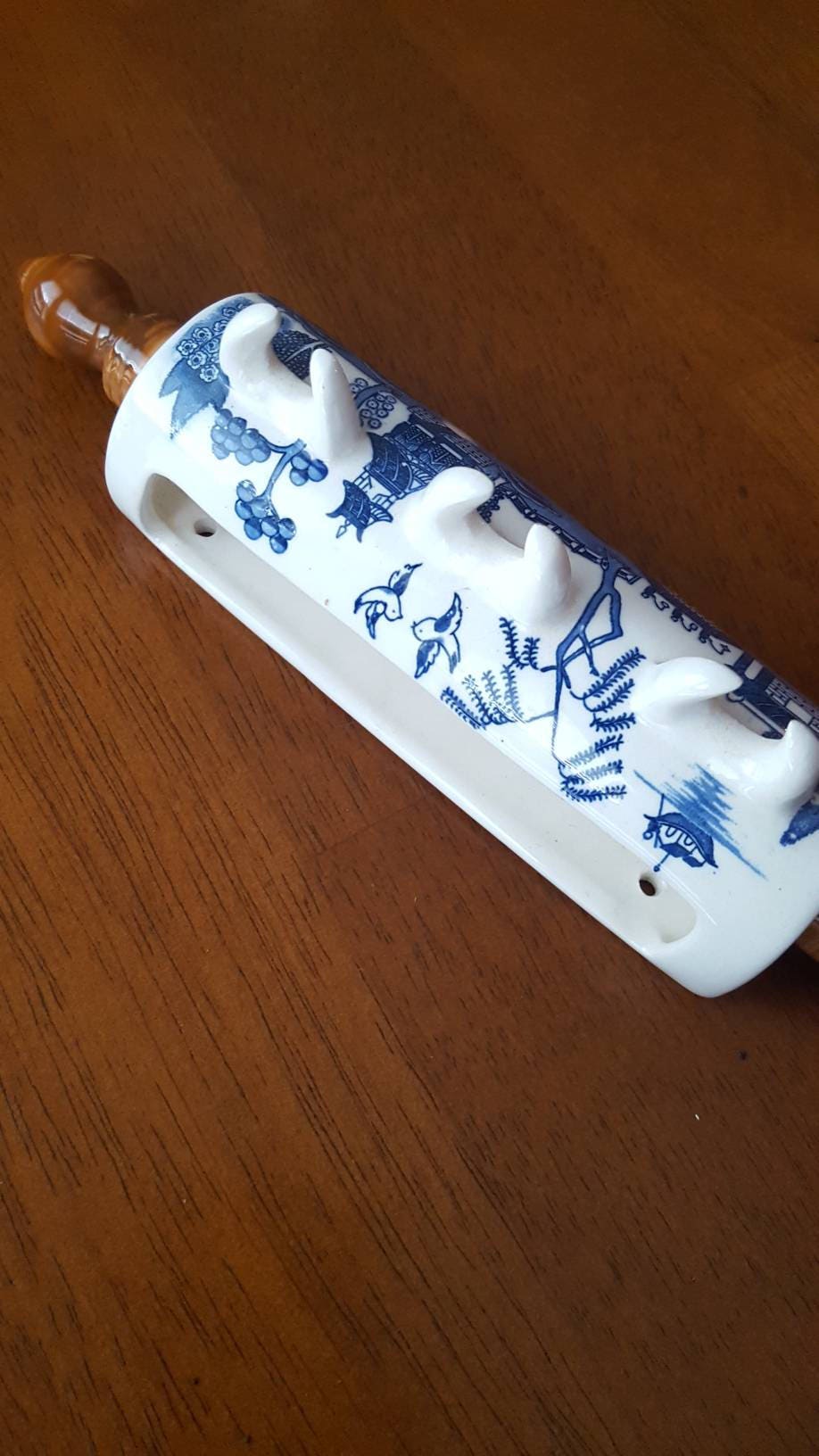 vintage blue and white willow pattern wall pocket rolling pin wall
