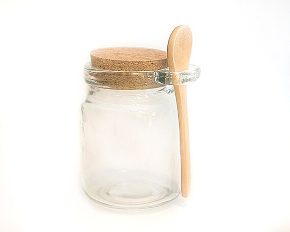 Glass jar with wooden spoon and cork top bath salts jar