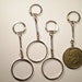 1 Silverplated U.S. Eisenhower and Liberty Dollar Coin Holder Coin Bezel Key Chains