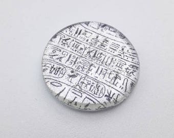 Hieroglyphs cabochon, fused dichroic glass with hieroglyph decoration.