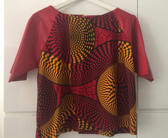 Handmade cropped top made of Vlisco fabric with red leather