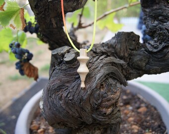 Pendant has been turned by hand in Laurel wood