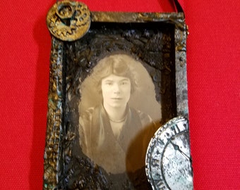 Vintage photo in handcrafted Steampunk frame