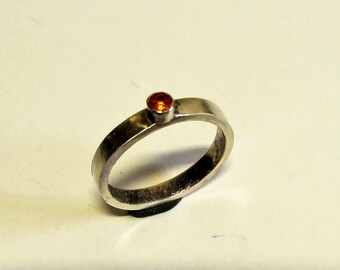 Sterling Silver ring with orange topaz of 3 mm