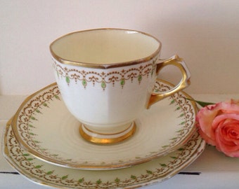 Vintage Art Deco Tea cup and saucer and side plate (tea cup trio) in tuscan plant bone china, 1930's vintage teacup trio.