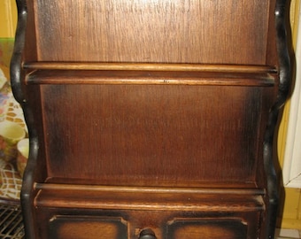 A spice drawer wooden shelf. Storage for spices. Country decor