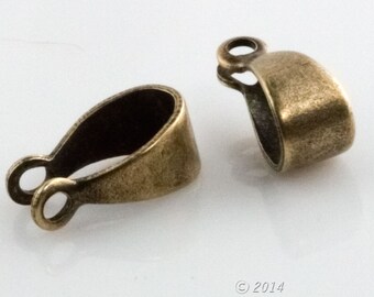 Smooth oxidized brass bail. 11x4mm. Pkg of 6. B9-2287(e)