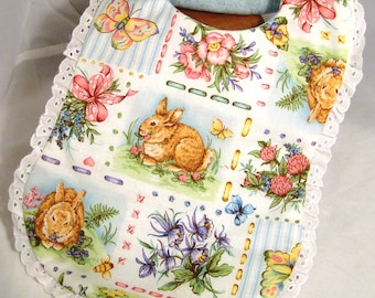 Eyelet-Trimmed Springtime Bunnies Baby Bib