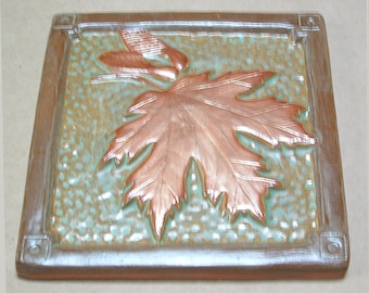 6 inch Maple Leaf Tile for fireplace or kitchen with green and copper glaze.