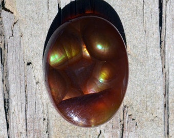 Fire Agate, Cabochon, Oval Shape, Natural Gemstone, Schiller Effect, 6.8 Carats, 16.4 x 12.3 x 4 mm . #0624