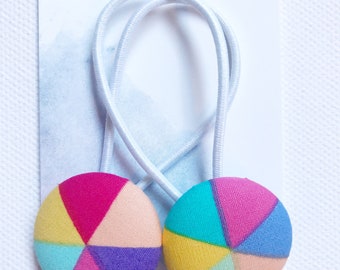 Colourful hairties, piggy tails, button hair ties