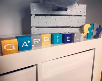 Wooden cubes with names