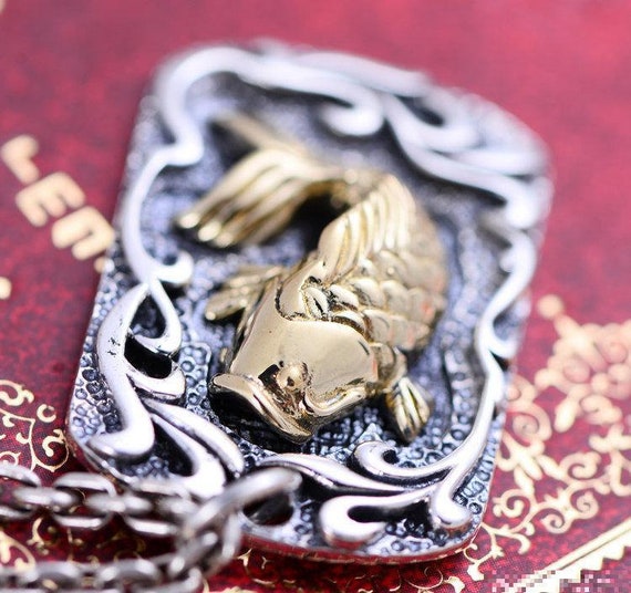 Unlock the HiddenKoi Fish meaning: Surprising Symbolism and Cultural Significance 29 koi fish color meaning chart koi fish pendant leaping in the water falls