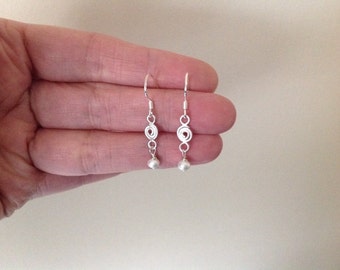 Sterling silver white pearl and swirl earrings
