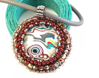 Fordite beaded bezel