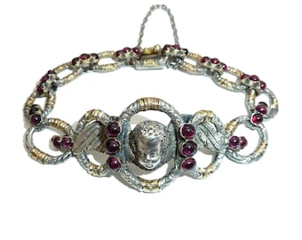 Antique French Silver And 18 Carat Gold Cherub Bracelet With Garnet Detailing