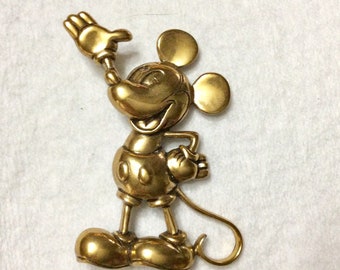 Vintage Disney Mickey Mouse gold toned metal brooch pin.