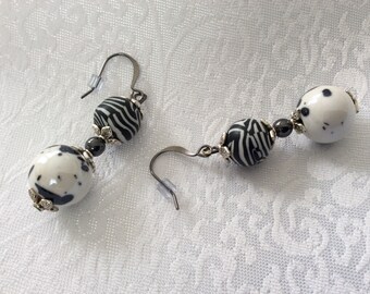 Pretty glazed Ceramic, hematite, and polymer clay dangle drop earrings on gunmetal earwires