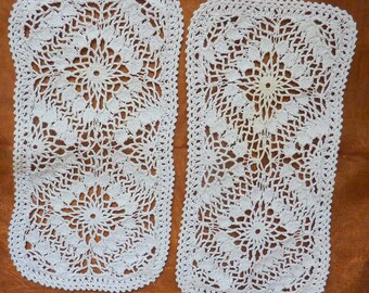 2 white doilies handmade using appliqué