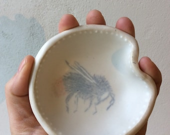 Little bowl for honey. With bee decorations