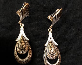Vintage brass clip-on earrings from Spain