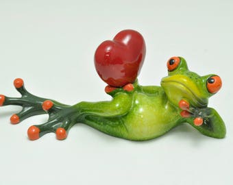 Lounging Frog Holding Heart