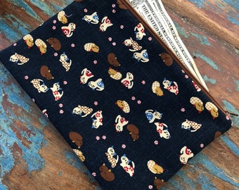 medium zipper pouch kitties hanging in the alley