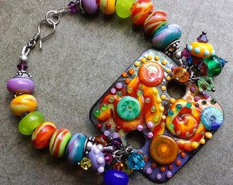 Stunning unique OOAK lampwork bead enamel glass focal bracelet, artisan handmade, bold, whimsical rainbow modern art jewelry