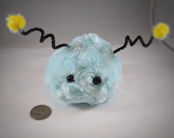 Moop: a handheld baby alien