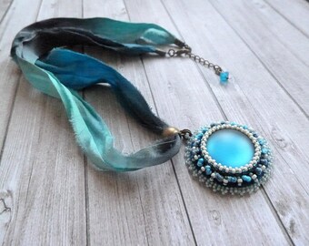 Embroidered blue cabochon and silk sari Ribbon necklace